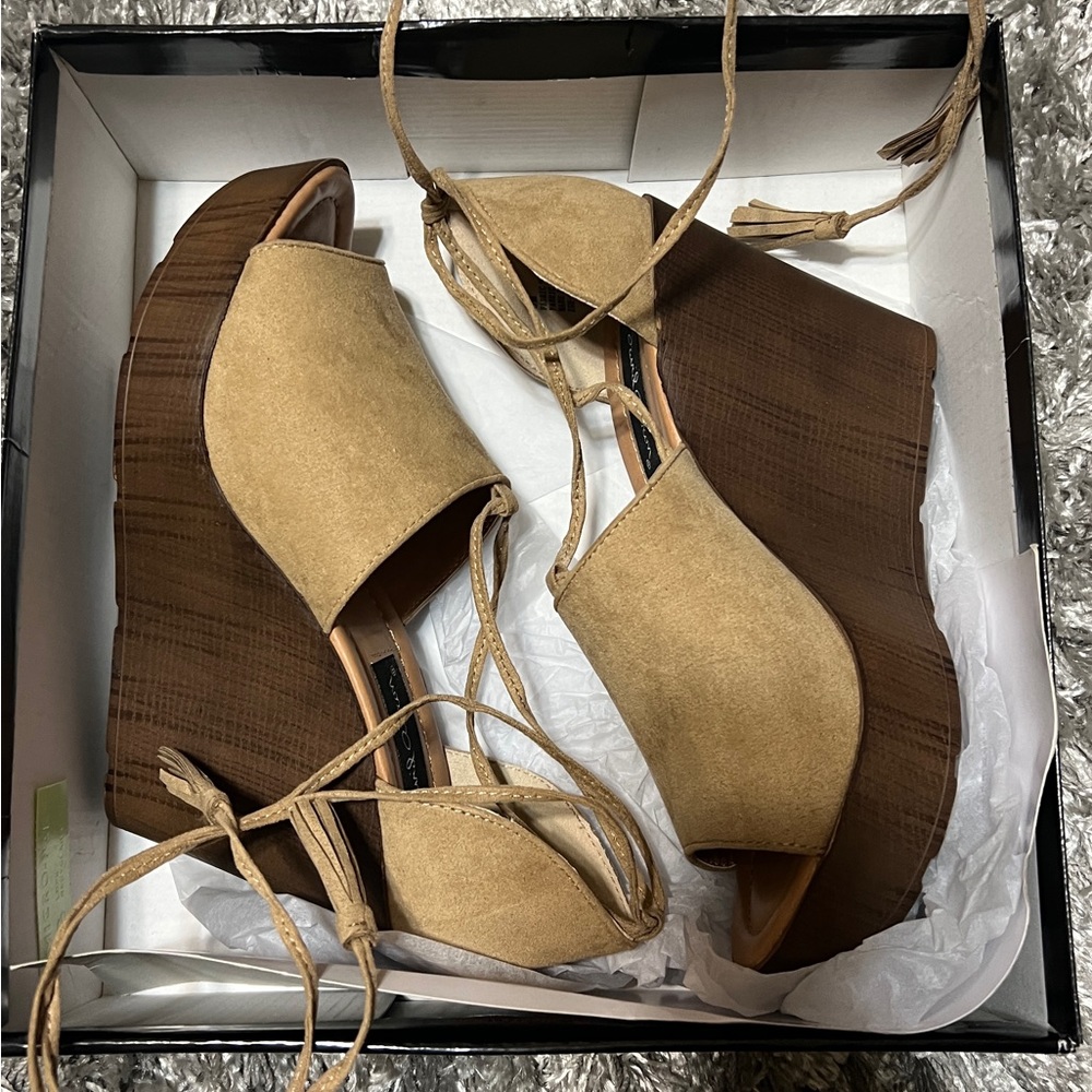 Zoe women’s wedge tie up heel